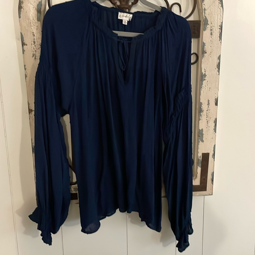 Wonderly navy blue long sleeve top. Lightweight with beautiful sleeve details.XL